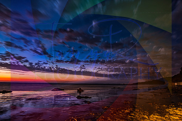Rainbow Sunset with Puffy Clouds